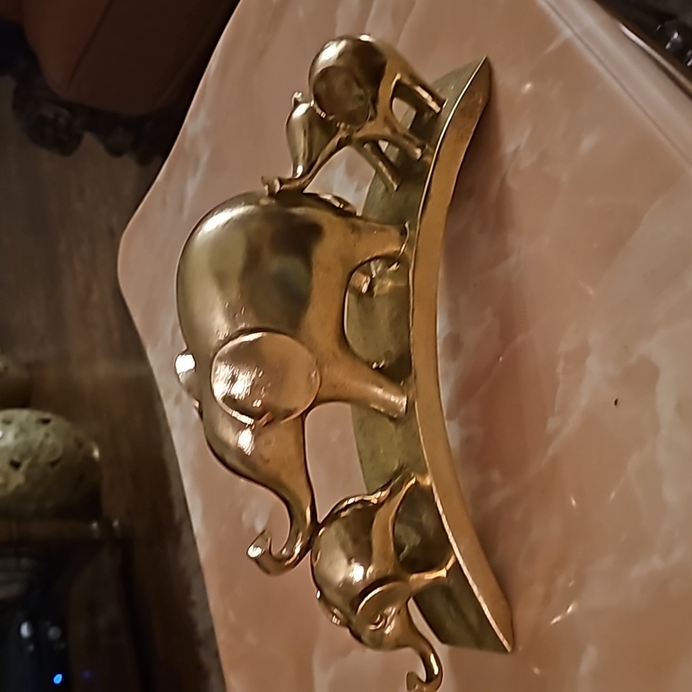 Very eye-catching interior Decor Golden metallic dining decor. 3 elephants.